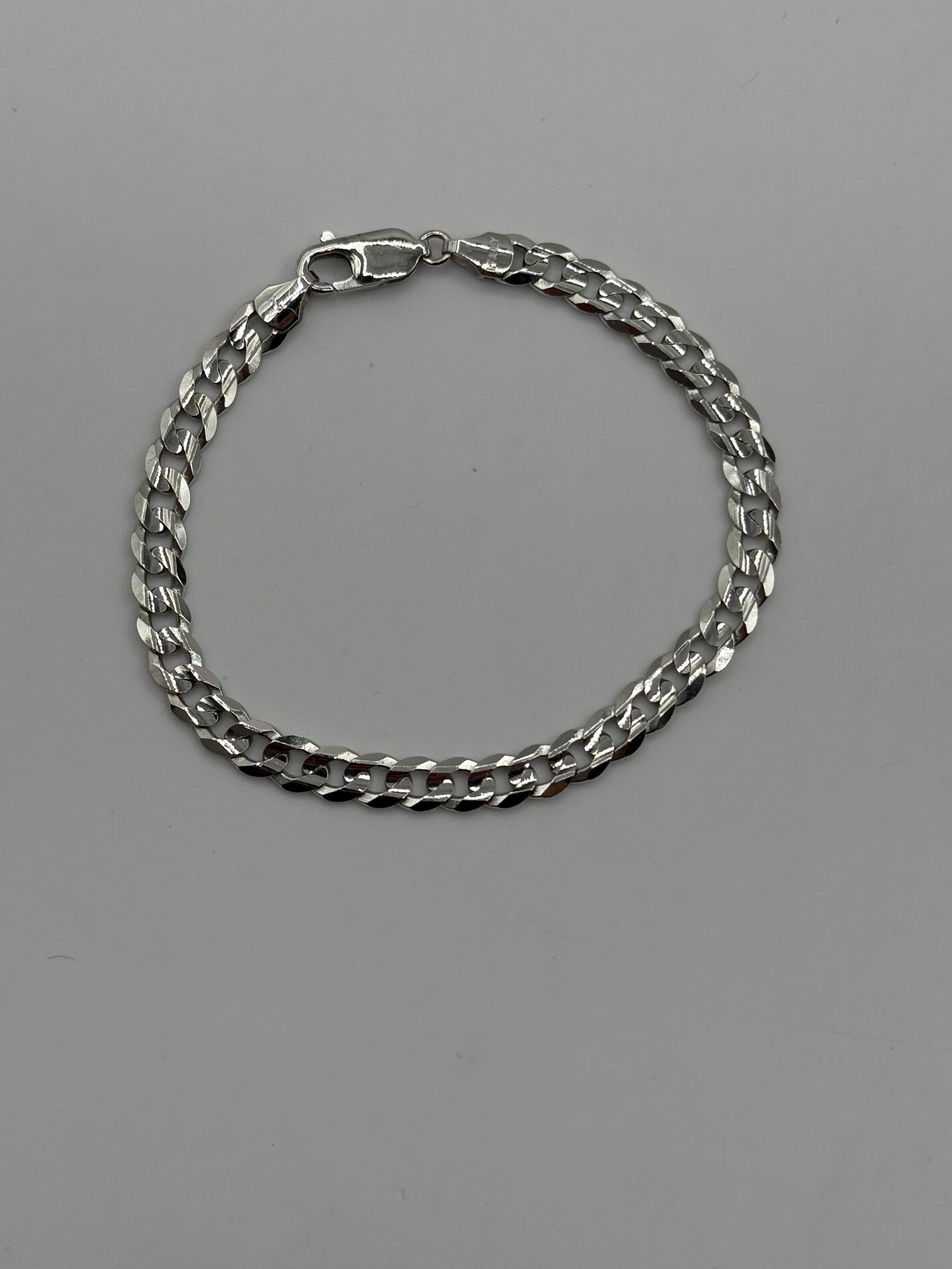 5.5mm Flat Curb Bracelet 7 inches (JACOJE STAMPED)